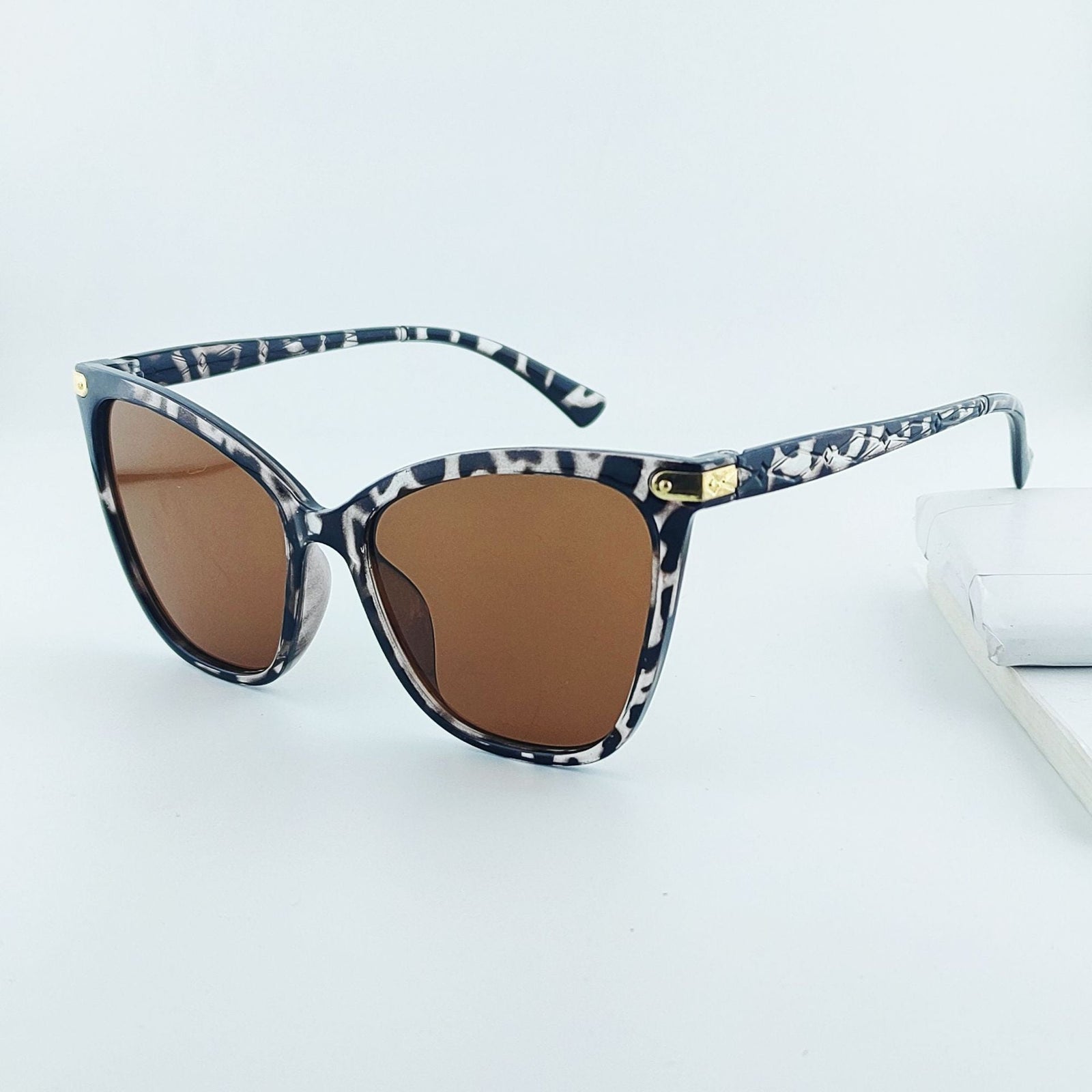 Lunettes de Soleil Femme Œil de Chat Tendance avec Protection UV 7