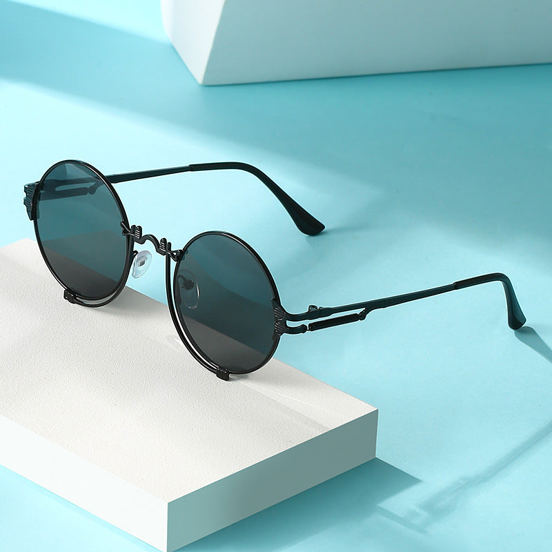Lunettes de soleil rondes en métal pour femmes au design artistique 1