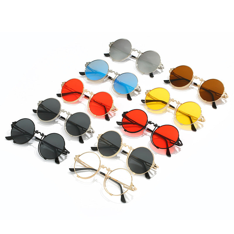 Lunettes de soleil rondes en métal pour femmes au design artistique 2
