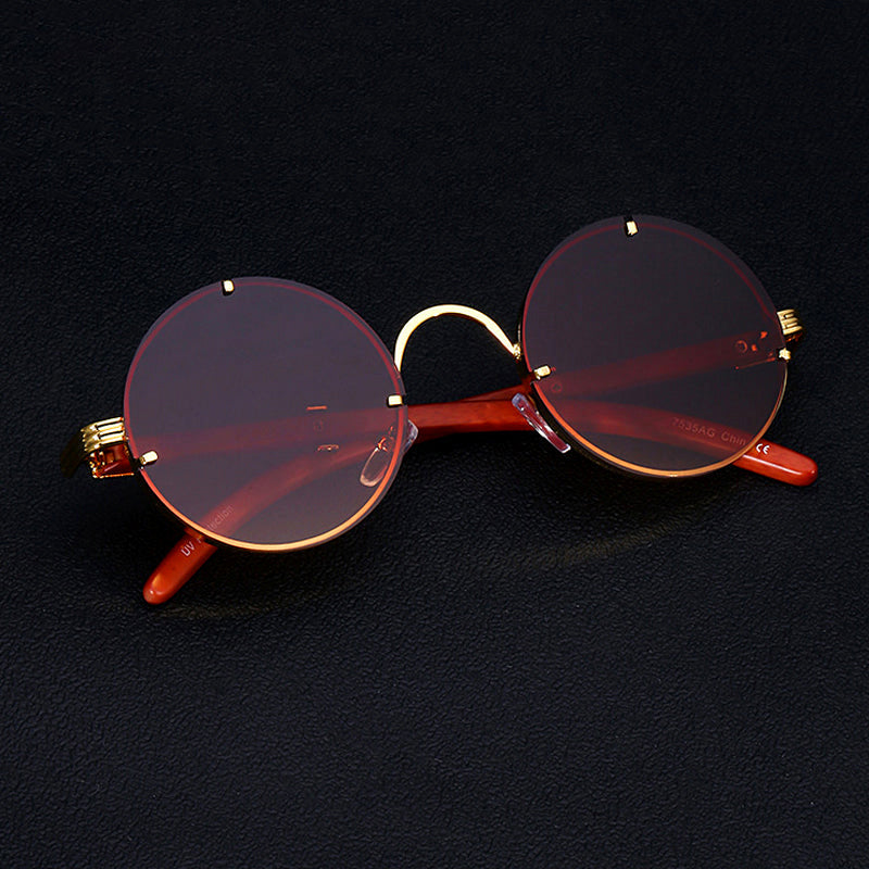 Lunettes de Soleil Ronde Femme Rétro avec Détails Dorés 1