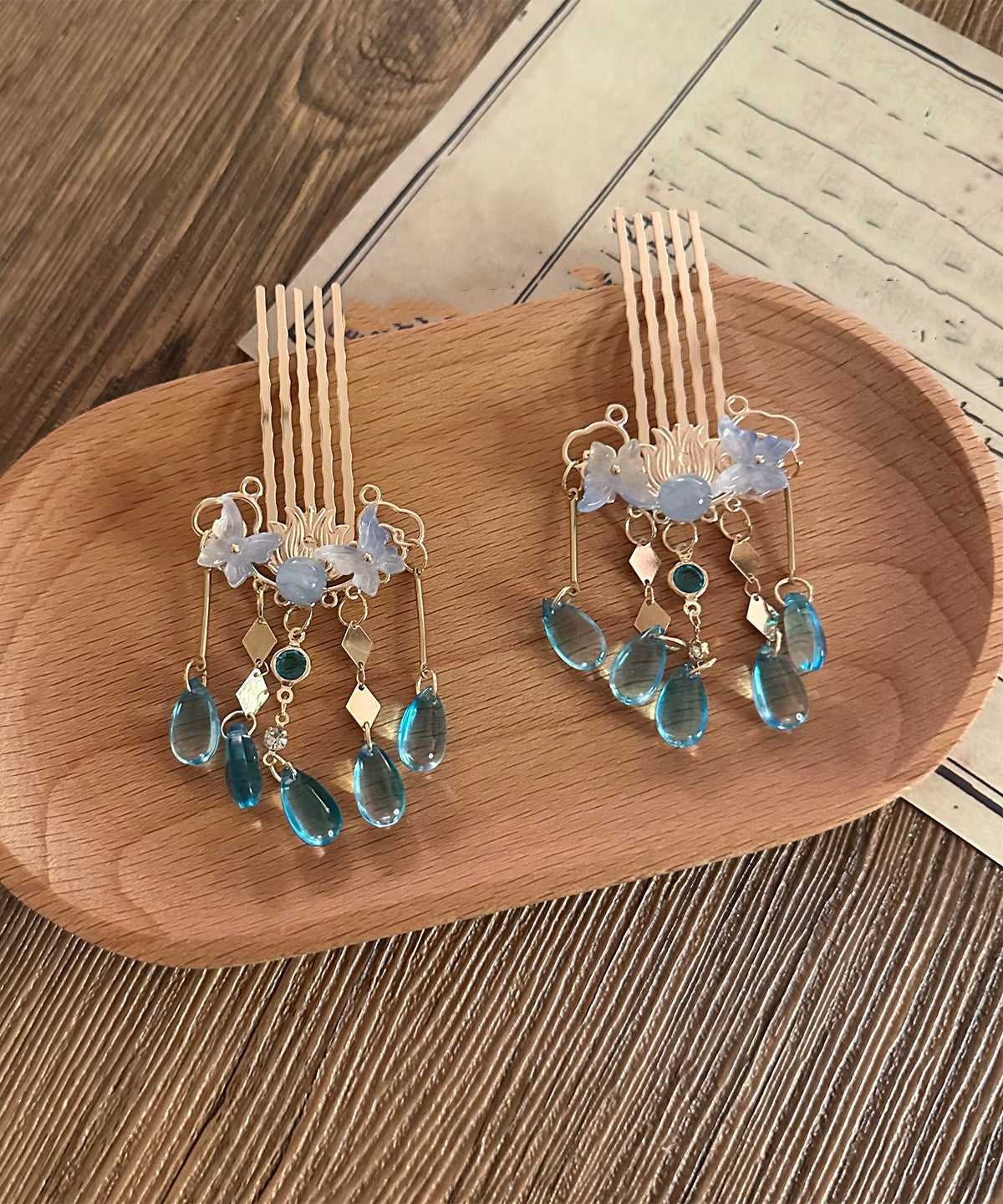 Paire d'épingles à cheveux papillon avec pompon bleu cuivre 4